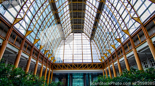 Image of glass roof structure space fram of modern building hall