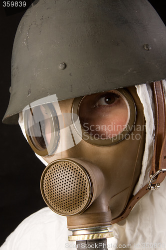 Image of woman in gas mask and helmet