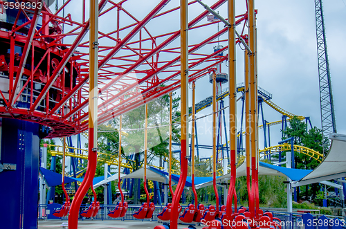 Image of crazy rollercoaster rides at amusement park