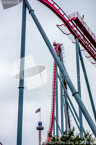 Image of crazy rollercoaster rides at amusement park