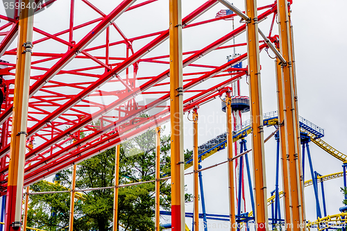 Image of crazy rollercoaster rides at amusement park