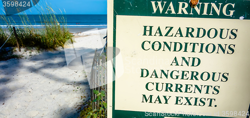 Image of hazardous rip currents warning sign on hunting island nc