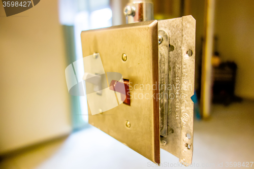 Image of light switch ready to get enclosed into wall during construction