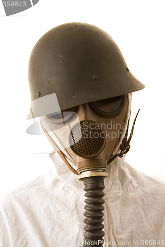 Image of Person in gas mask and helmet