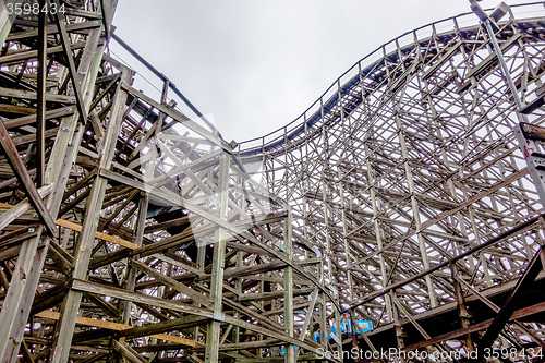 Image of crazy rollercoaster rides at amusement park