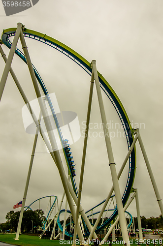 Image of crazy rollercoaster rides at amusement park