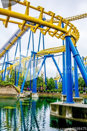 Image of crazy rollercoaster rides at amusement park