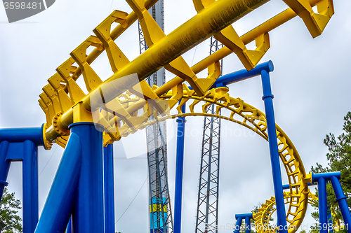 Image of crazy rollercoaster rides at amusement park