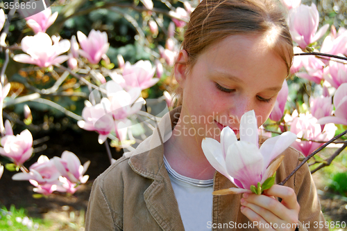 Image of Girl with magnolia