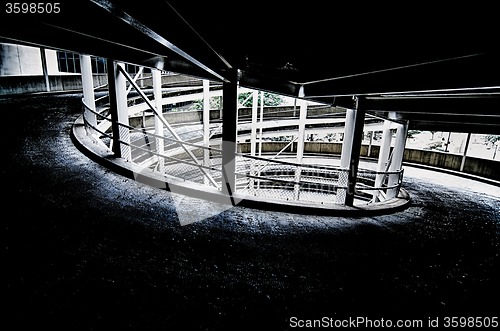 Image of spiral ramp on multistory  parking exit in a big city