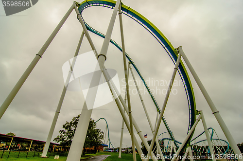 Image of crazy rollercoaster rides at amusement park