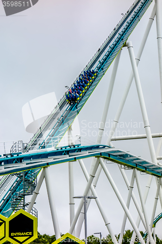 Image of crazy rollercoaster rides at amusement park