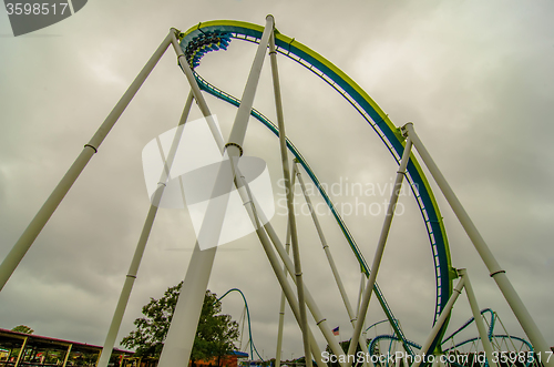 Image of crazy rollercoaster rides at amusement park