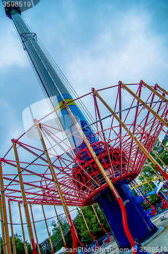 Image of crazy rollercoaster rides at amusement park