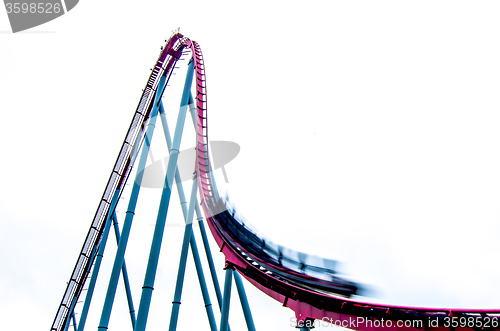 Image of crazy rollercoaster rides at amusement park