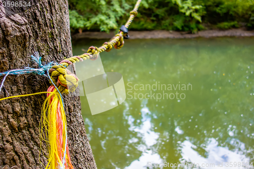 Image of swing jump rope for jumping into river