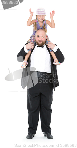 Image of Little Girl Sitting on Shoulders Man Have Fun