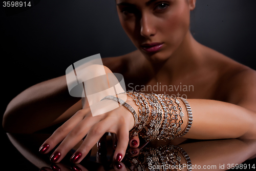 Image of Young Woman With Bracelets