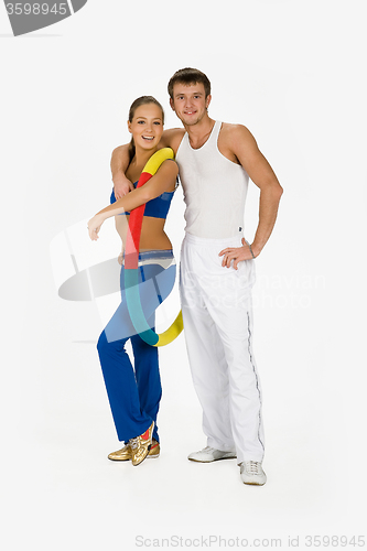 Image of Young Woman And Man With Training Device