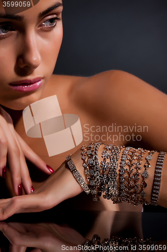 Image of Young Woman With Bracelets