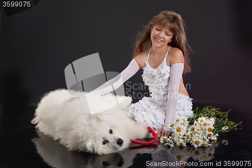 Image of Girl And Husky