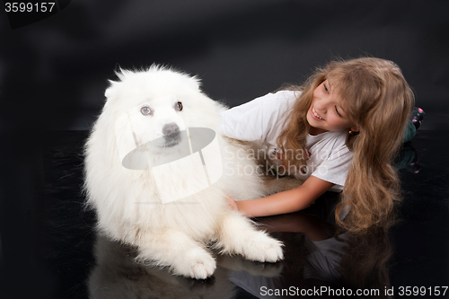 Image of Girl And Husky