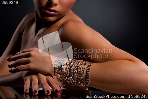 Image of Young Woman With Bracelets