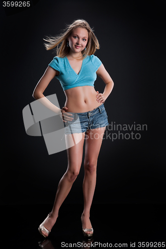 Image of Young Woman In Jeans Shirt