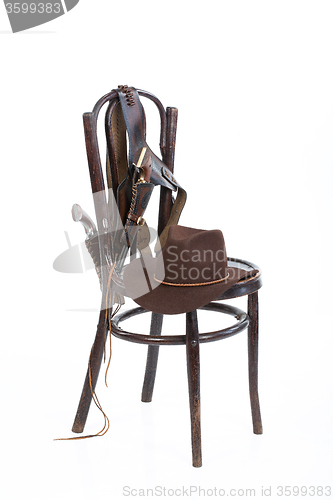 Image of Old Chair And Cowboy Belt