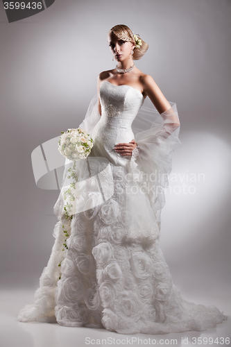 Image of Young Beautiful Woman In A Wedding Dress