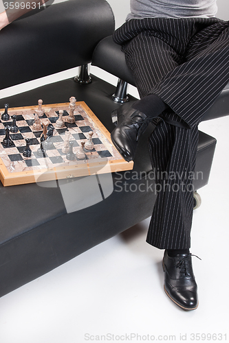 Image of Man\'s Legs And Chess