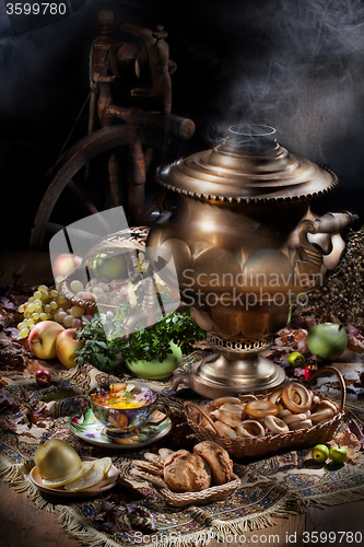 Image of Still Life With Samovar, Fruits, Tea And Spinning Wheel