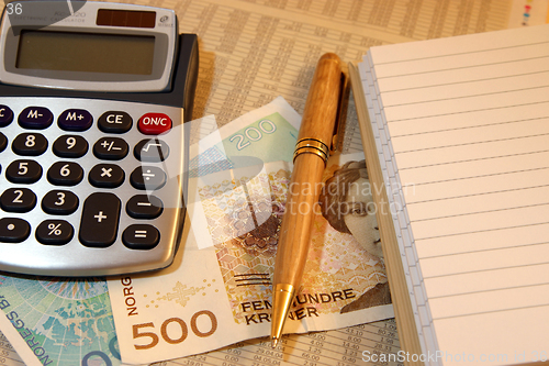 Image of Calculator and money