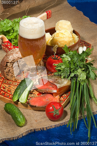 Image of Still Lif With Beer And Potatoes