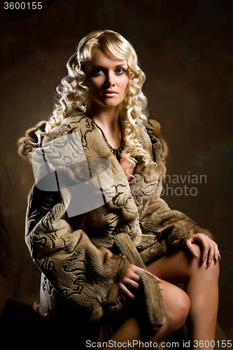 Image of Young Beautiful In A Fur Coat