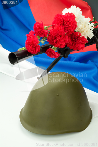 Image of Machinegun And Flowers