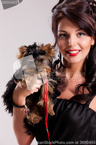 Image of Young Woman With A Little Dog