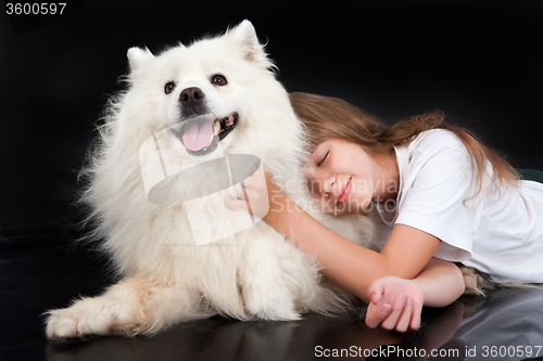 Image of Girl And Husky