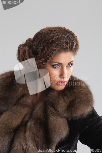 Image of Young Beautiful Woman In a Fur Coat