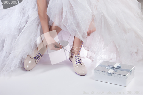 Image of Woman\'s Legs And Wedding Dress