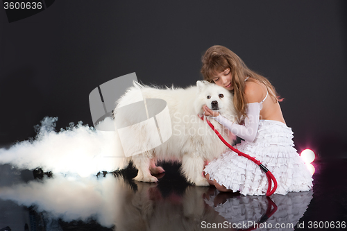 Image of Girl And Husky