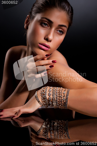 Image of Young Woman With Bracelets