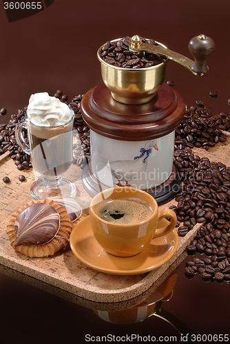 Image of Coffee Mill And Yellow Cup