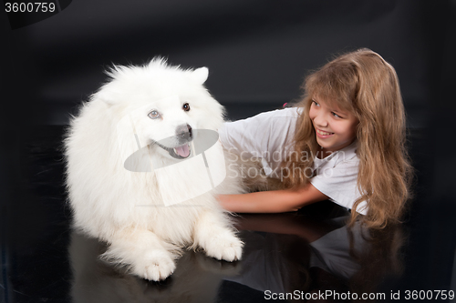 Image of Girl And Husky