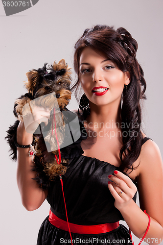 Image of Young Woman With A Little Dog