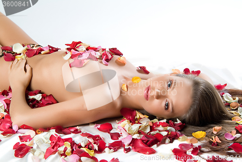 Image of Young Woman And Rose Petals