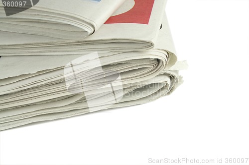 Image of pile of daily newspapers