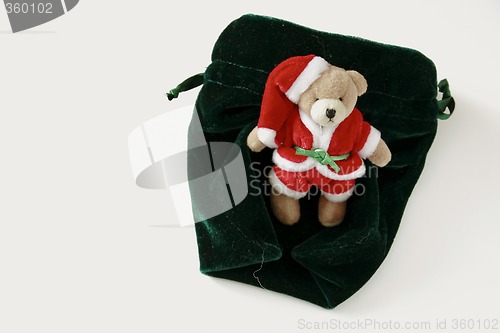 Image of teddy santa gift wrapping