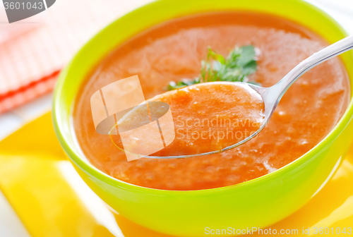 Image of Fresh soup from pumpkin in the green bowl