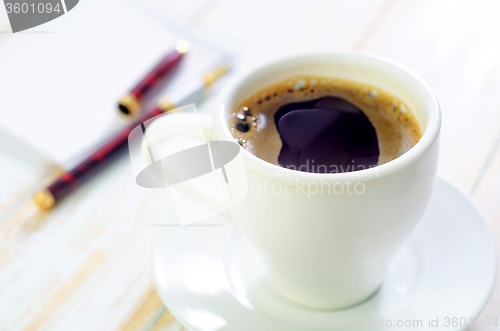 Image of coffee and note